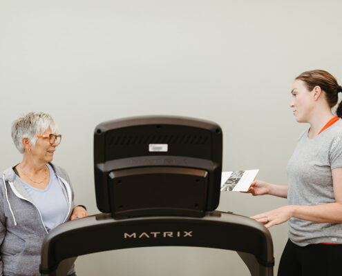 Customer testing a Matrix treadmill during a P50 Equipment event in Bismarck.