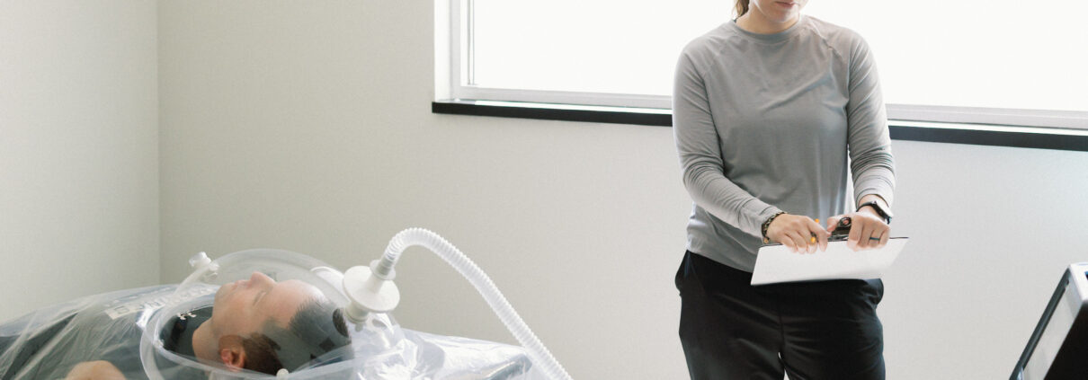 Person completing a Resting Metabolic Rate (RMR) assessment at Proximal50 in Bismarck, ND to measure resting metabolism and calorie expenditure.